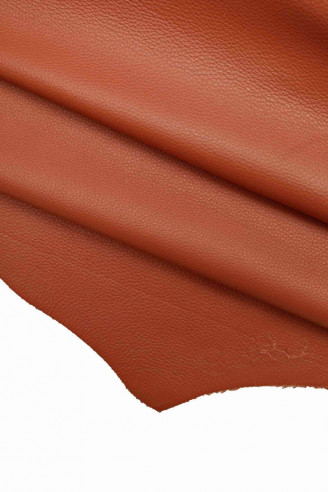 Italian leather, brick red color with dollar grain print, very soft and rubbery to the touch, semi-glossy B11996-VT