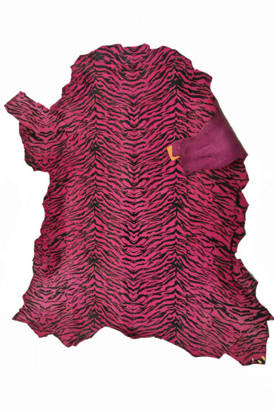 Pellame italiano, cavallino base fucsia con stampa zebra col. nero, colori molto intensi, mano morbida, look sportivo