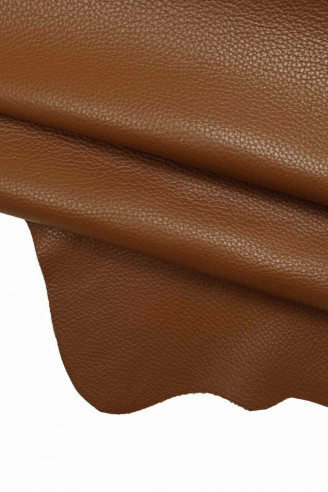 Italian leather, brown chutney half calfskin with dollar grain print, quite shiny, very soft, sporty look