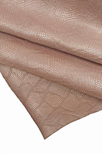 Italian leather, half calfskin with snakeskin print engraved in pearly lilac color, quite shiny, medium softness, sporty look