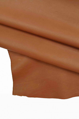 Italian leather, milled brick red half calfskin with slight irregular grain, semi-gloss, very soft, vintage / sporty look