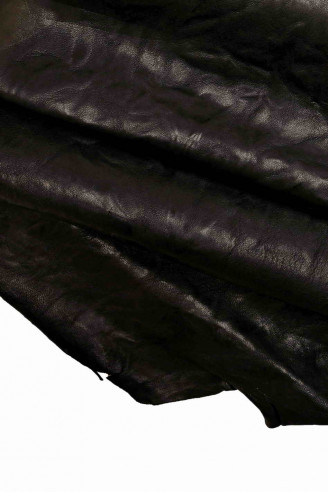 Italian leather, vegetal tan, black with light and shade effect wrinkled effect washed, quite glossy, medium softness B12695-TB