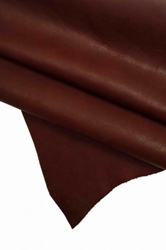 Italian leather, super vintage burgundy goatskin with clouds of color, irregular grain and wrinkled effect