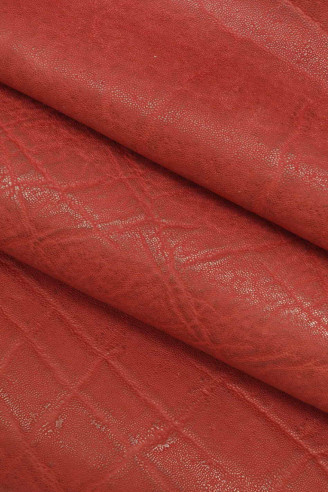 Pelle italiana, mezzo vitello rosso...