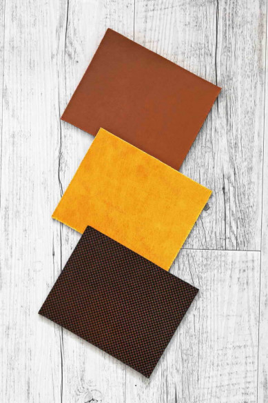 CORK on LEATHER sheets backed natural cork,made in Italy, brown and gold print, calfskin 3 versions available on the back