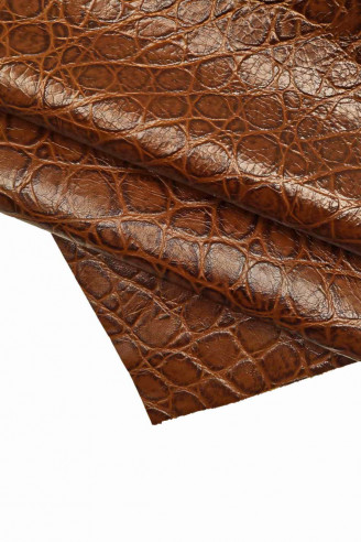Crocodile embossed leather hide, brown crock printed calfskin, slightly wrinkled, glossy, soft skin