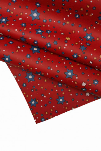STAR PRINTED leather hide, red cowhide with yellow, blue, white texture, matt multicolor calf skin