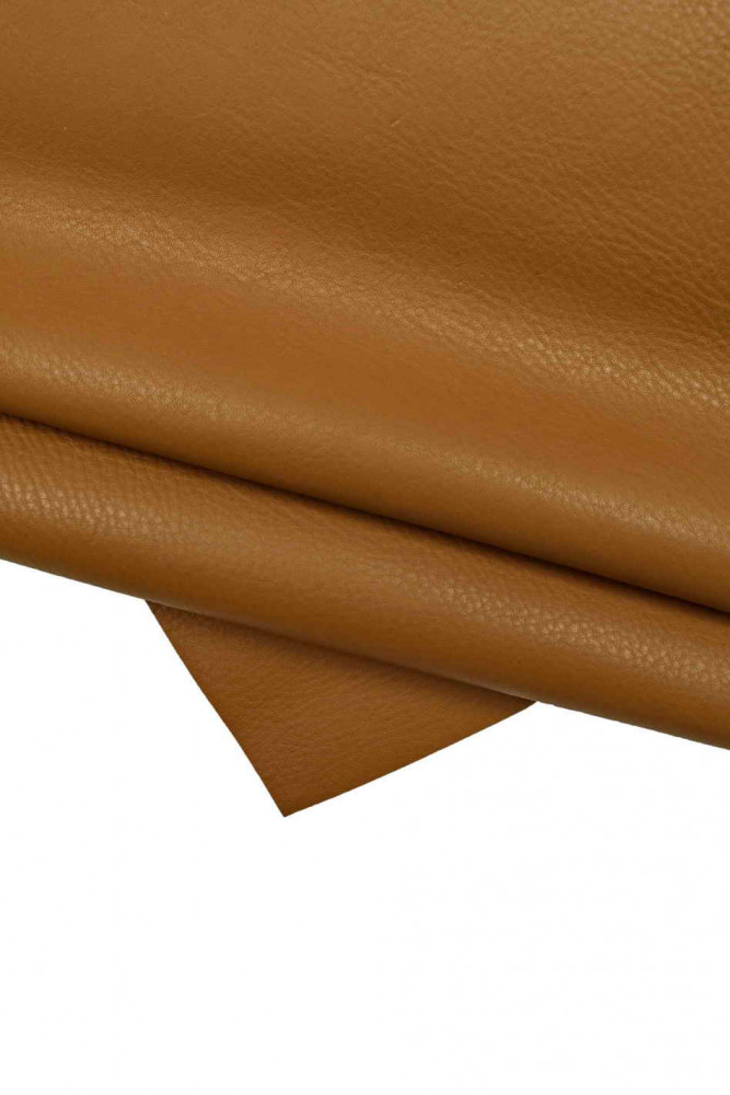 Brown SPORTY calfskin, soft pebble grain leather hide, solid color milled cowhide