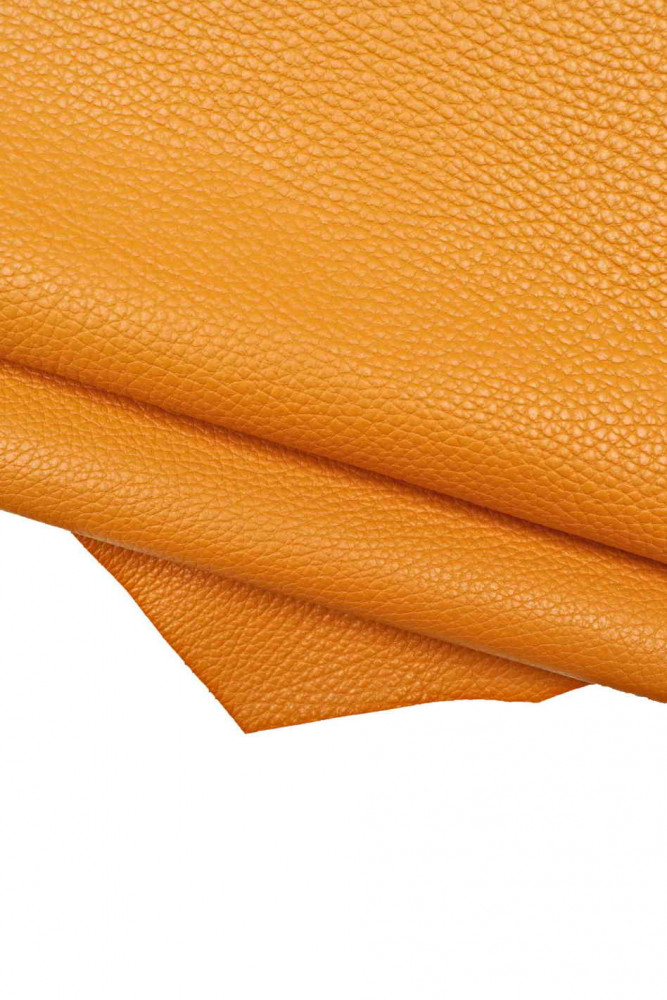 Ocher yellow CALFSKIN, pebble grain print leather hide, light orange soft cowhide