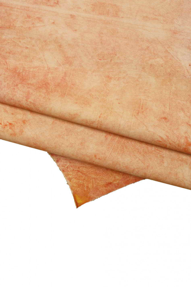 TYE dye effect leather hide, orange cowhide with shades, bleach effect, soft, matt, artistic calfskin