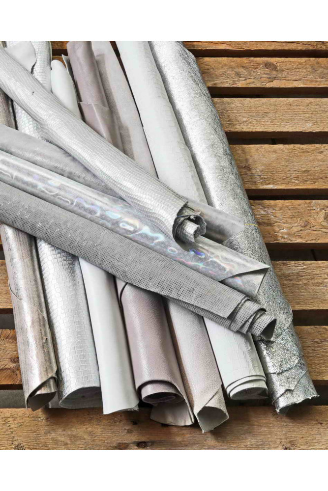 Pelli intere, toni BIANCO e ARGENTO,...