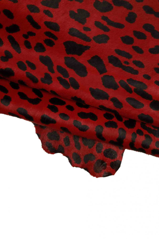LEOPARD textured pony calfskin, red black animal printed hair on leather hide, soft hairy cowhide