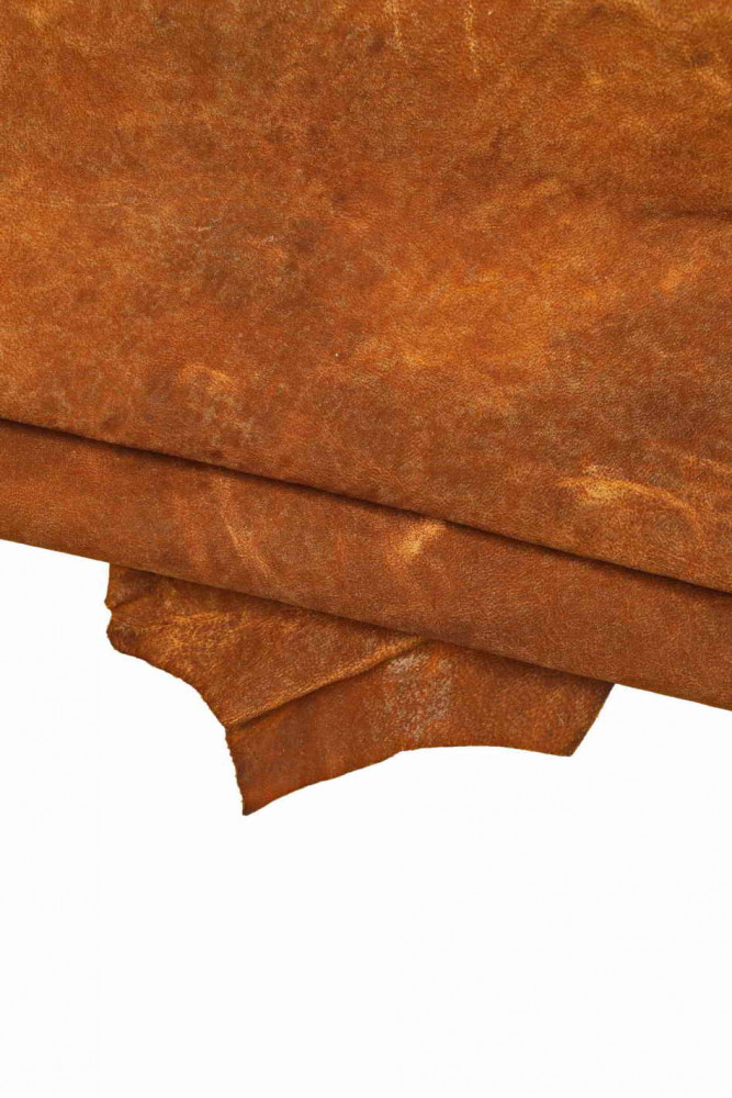 Rust brown VINTAGE leather skin, vegetable oil tan matt goatskin, pull up medium softness hide