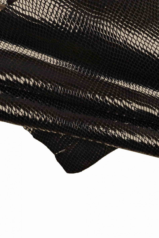 Black REPTILE printed leather skin, glossy snake textured goatskin, metallic suede effect hide