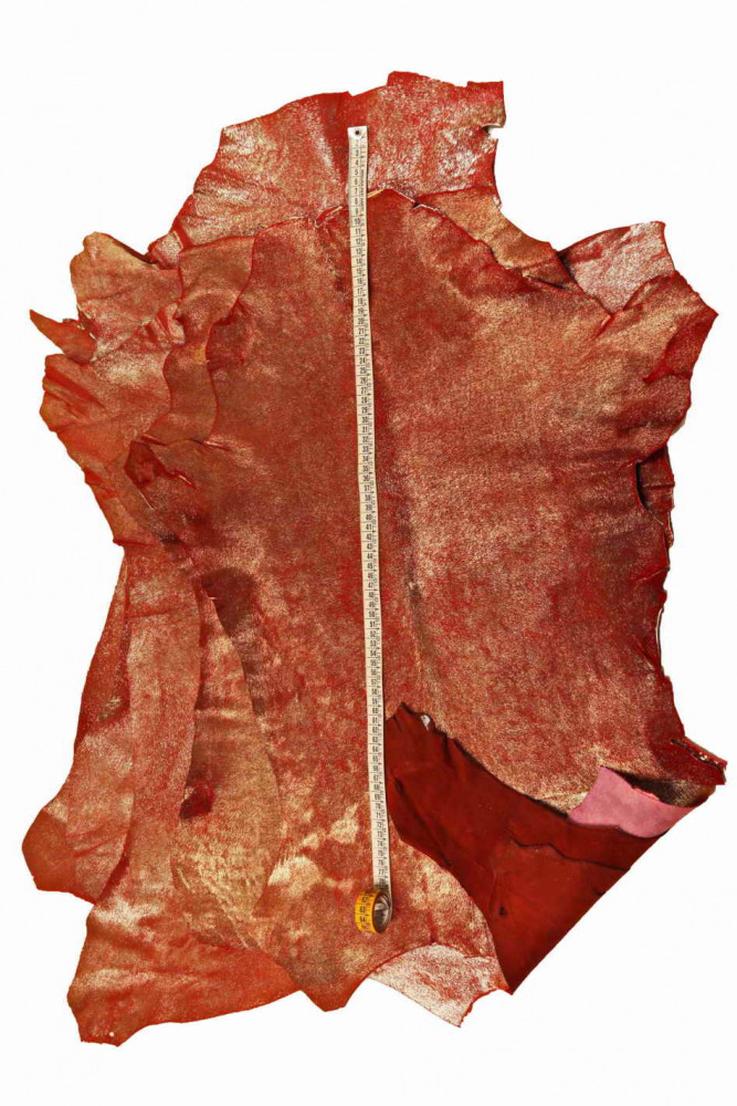 Red METALLIC hair on leather hide,...