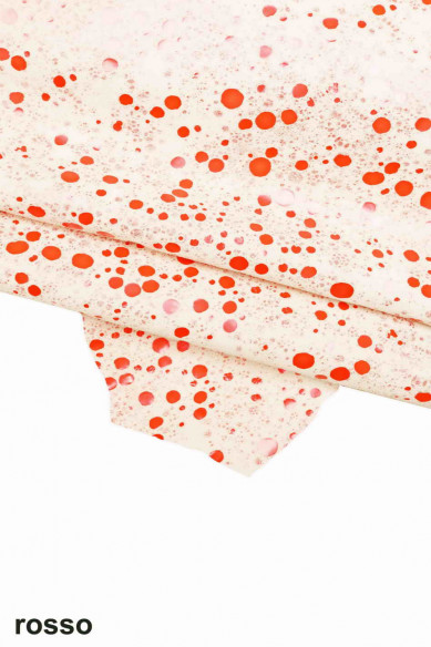 Pelle stampata SCAMOSCIATA, pellame di camoscio base bianco con motivo giallo, rosso e blu, camoscio su capra morbido