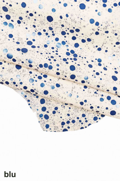 Pelle stampata SCAMOSCIATA, pellame di camoscio base bianco con motivo giallo, rosso e blu, camoscio su capra morbido