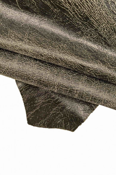 Pelle stampa CRACKLE nero su base verde militare, capra scamosciata motivo craquelé morbida lucida