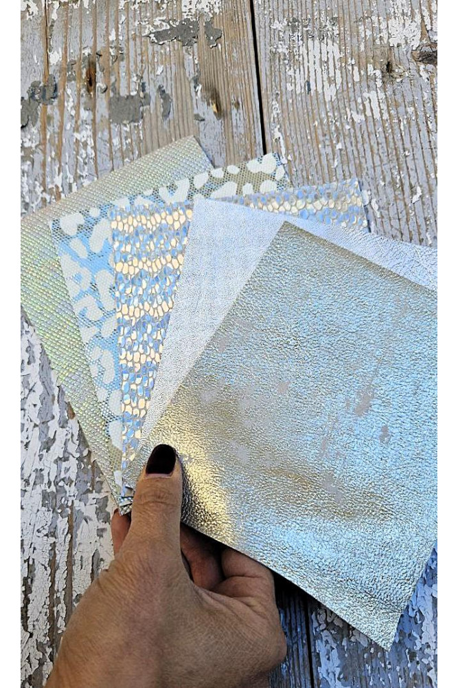 5 Selected leather scraps,silver,...