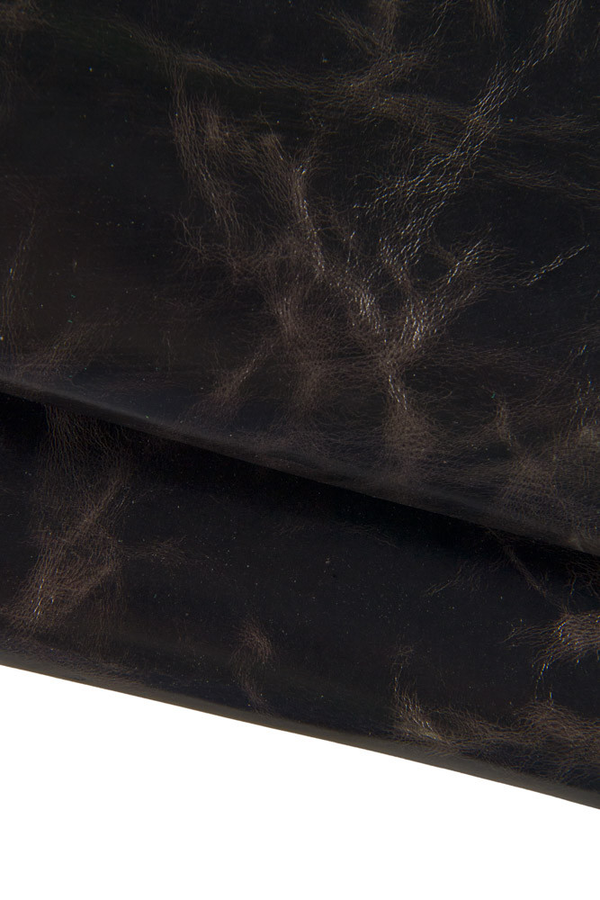 Purplish brown DISTRESSED leather...