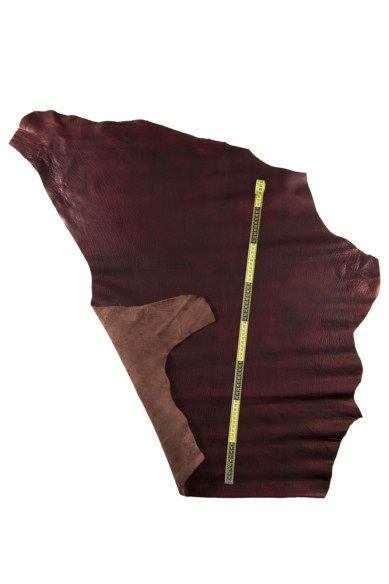 Pelle INVECCHIATA bordeaux, capra tamponata con grana, pellame sportivo morbido metallizzato