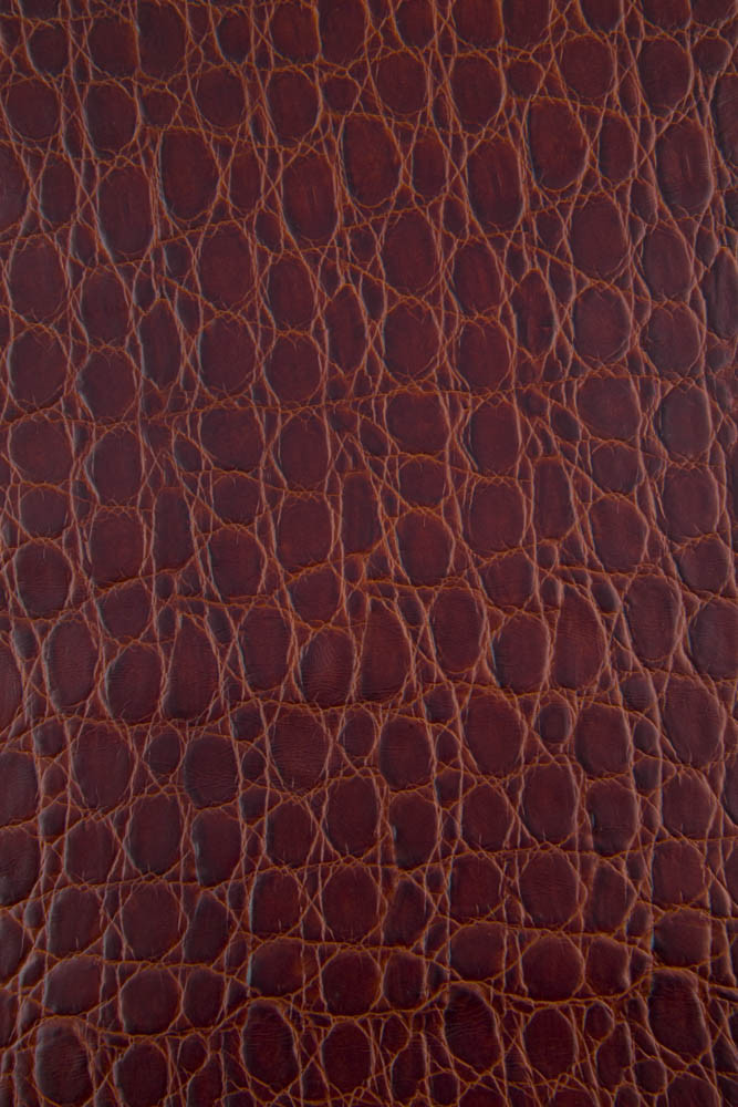 Reddish brown CROCODILE embossed...
