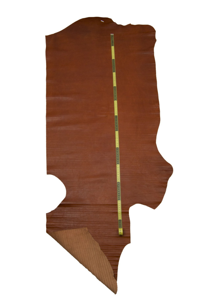 Genuine CARVED leather hide, reddish...