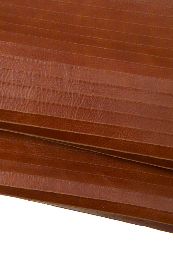 Genuine CARVED leather hide, reddish...