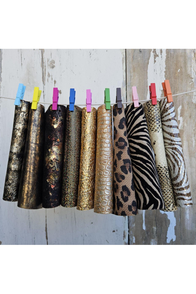 10 Gold and bronze printed leather...