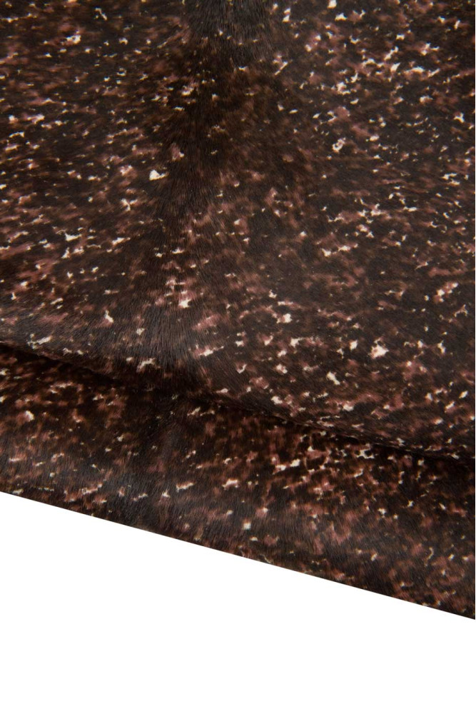 SPOTTER HAIR on leather hide, animal...